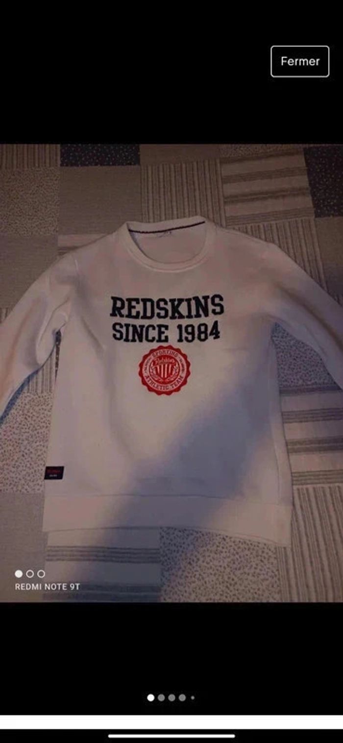 Pull Redskins garçon taille 16 ans en bon état.
