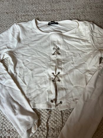 Pull ouvert sur le devant taille M