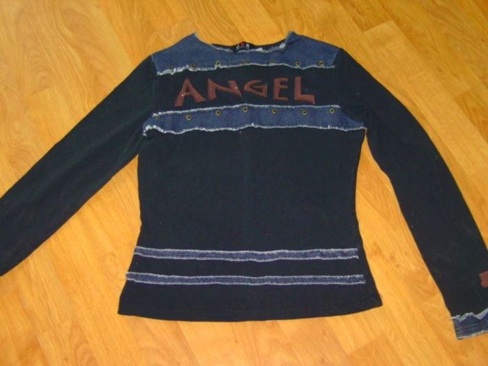 Tee shirt JR COLLECTION noir et mention "ANGEL" 12 ans TBE
