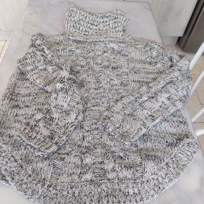 Pull grand col roulé