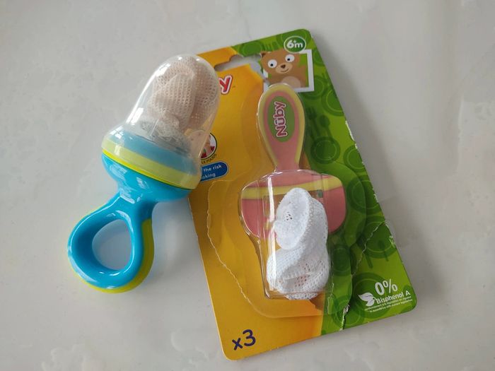 Grignoteuse Nuby + 1 filet de rechange