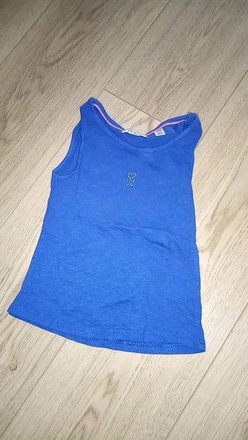 Débardeur okaïdi fille taille 5 ans Très bon état.