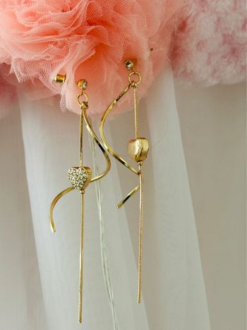Boucles d’oreilles pendantes cœurs strass