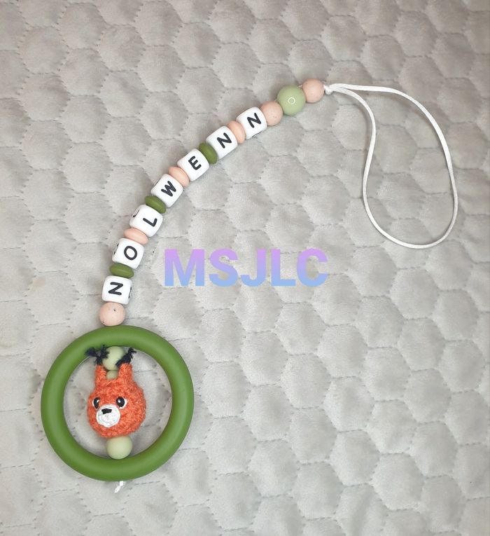 Attache tétine dentition