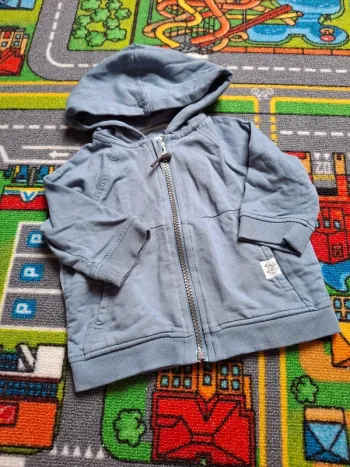Gilet avec capuche