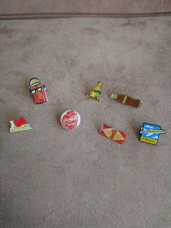 Lot de 7 pin's coca