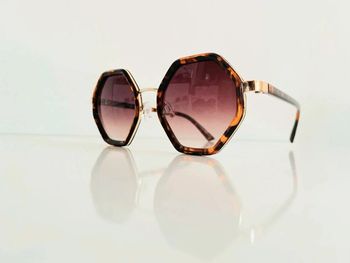 Lunette de soleil marron léopard hexagonale mixte verres dégradés uvprotection catégorie 3