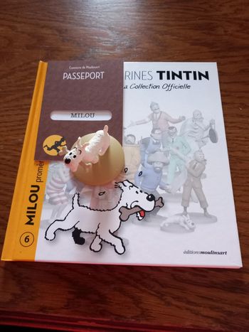 Figurine Milou promène son os