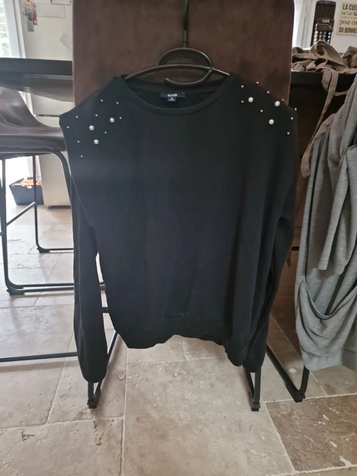 Pull avec perles