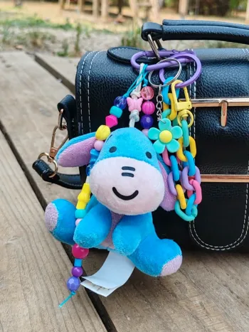 Bijou de sac gri-gri bourriquet Winnie l'ourson