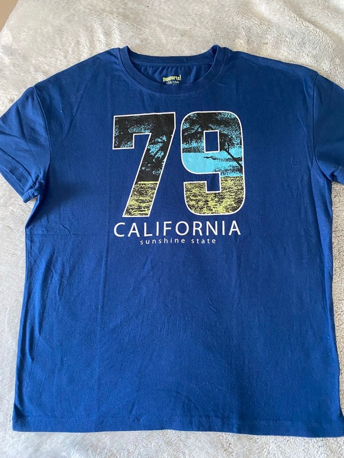 T-shirt bleu en 12/14ans