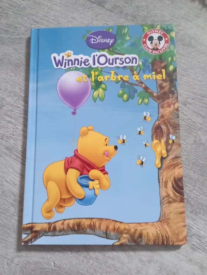 Winnie l'ourson et l arbre a miel