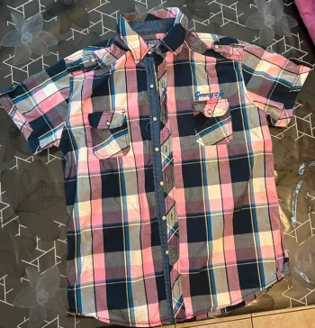 Chemise à carreaux rose