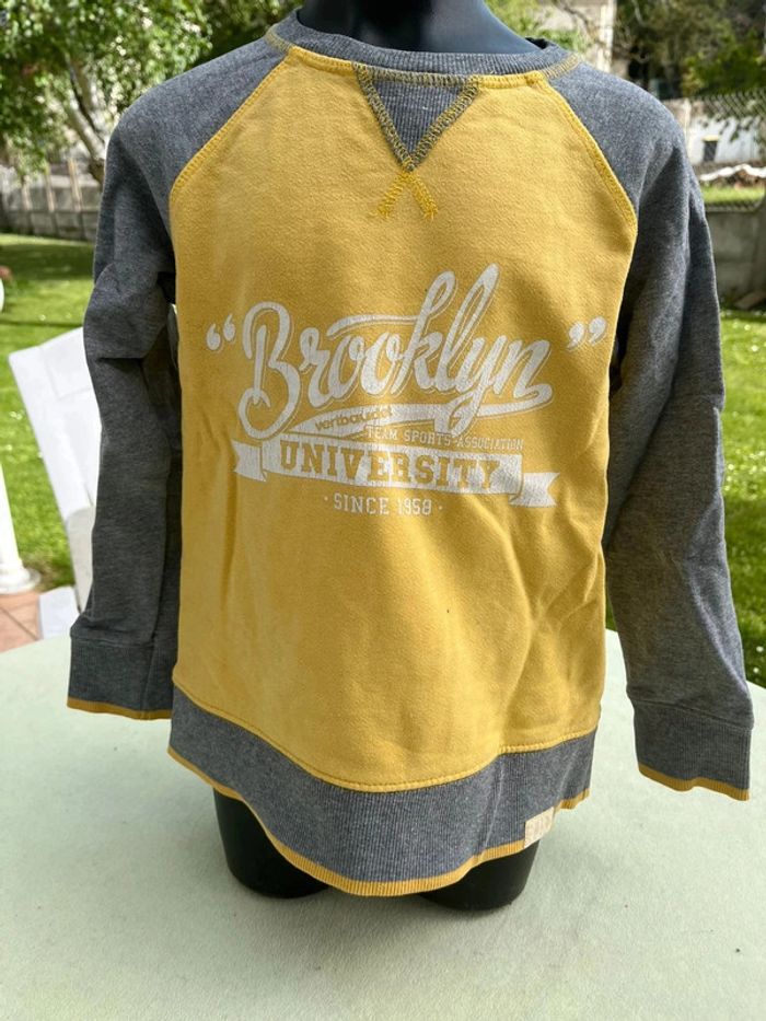 Pull jaune verbaudet taille 8 ans