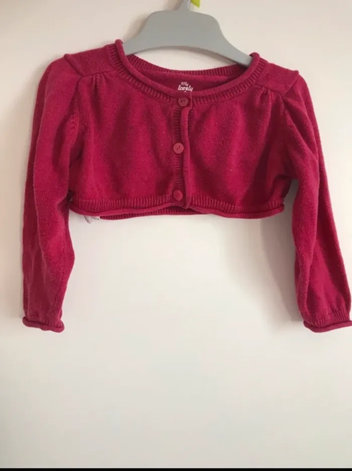 Boléro fuschia 6 mois