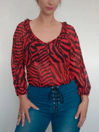 Blouse zébrée rouge et noir taille unique
