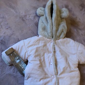 Manteau fausse fourrure