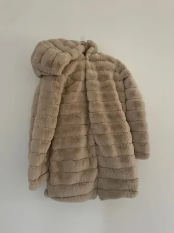 manteau fourrure assez long