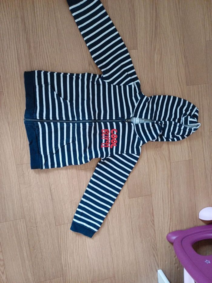 Gilet capuche