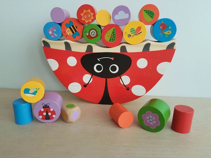 Jeu à bascule en bois coccinelle équilibriste