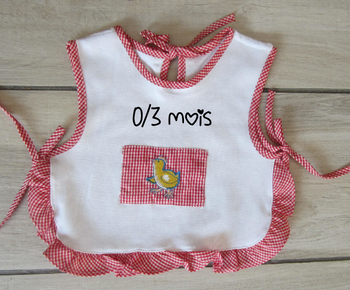 Bavoir/tablier neuf bébé fille