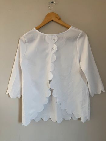 Blouse blanche crantée