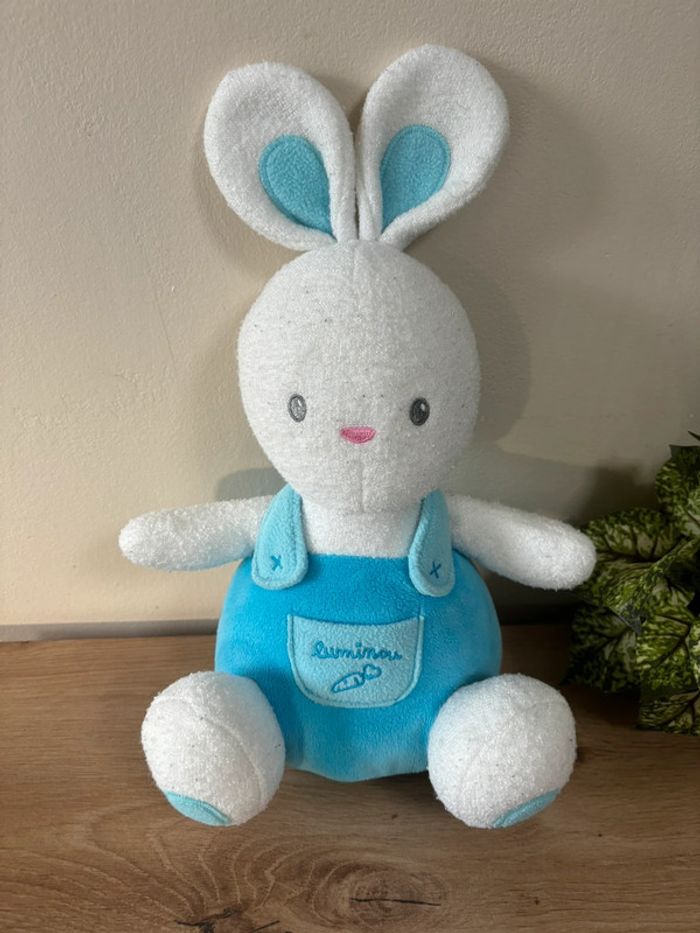 Doudou lapin luminescent bleu blanc luminou 30 cm