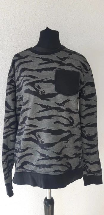 Pull kaki et noir taille L