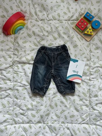 jean bleu doublé resserré au bas des jambes pressions entre les jambes kimbaloo 1 mois
