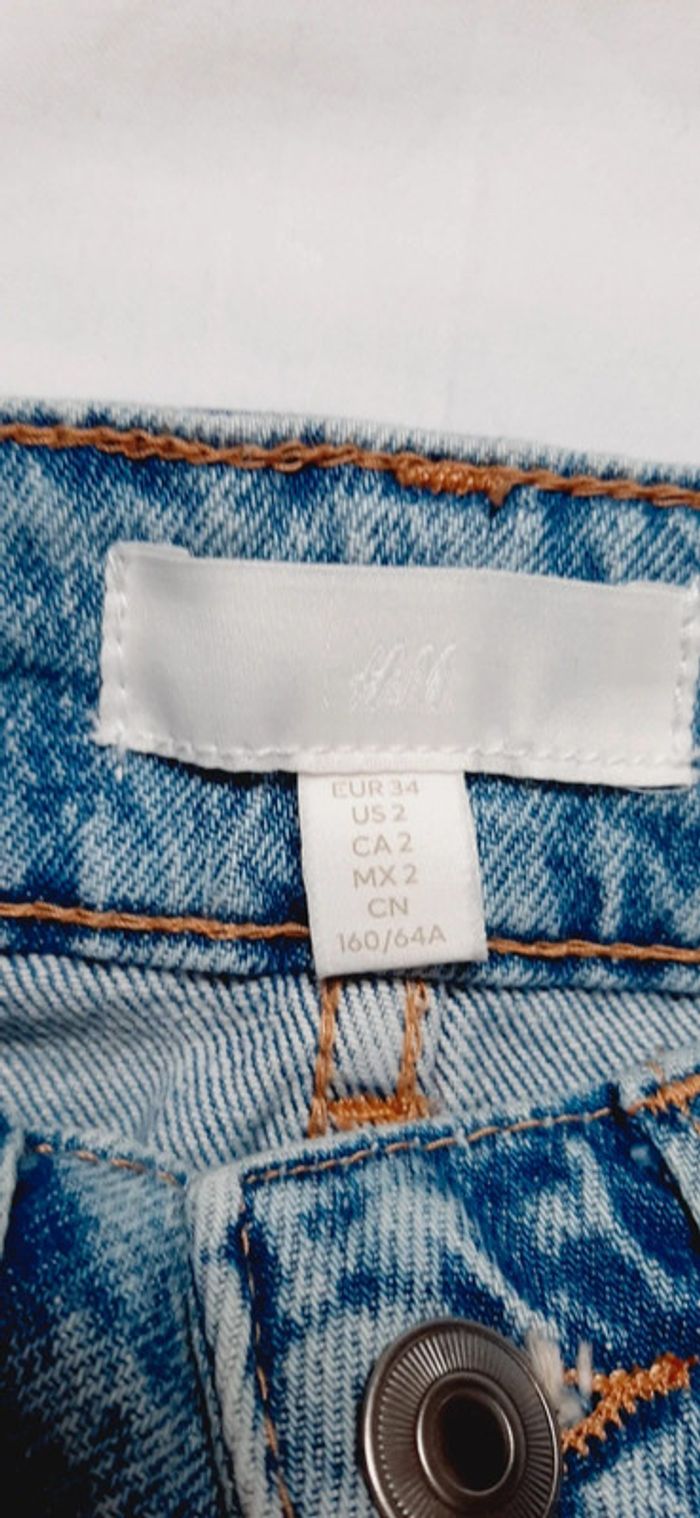 Jeans évasés troués - photo numéro 3