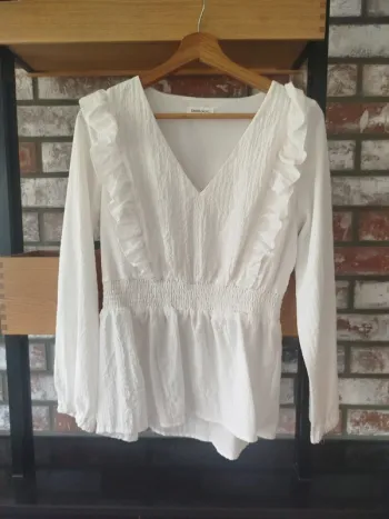 Haut a manches longues crème taille 38 neuf
