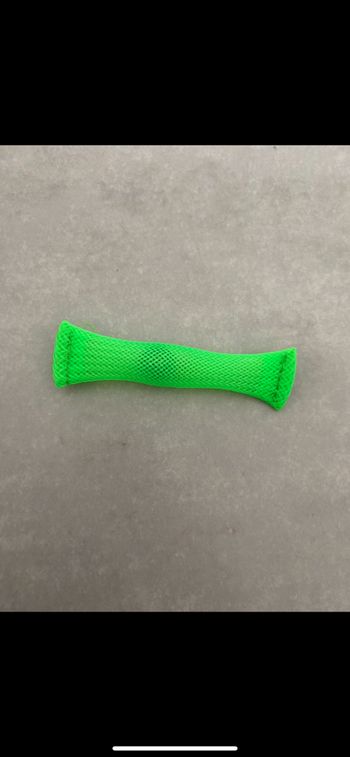 Jouet bille dans tube