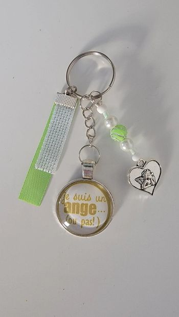 Cadeau humour, porte clé message bijoux de sac " je suis un ange ou pas "