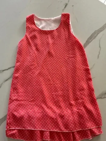 Robe corail à pois blancs – Taille 10 ans