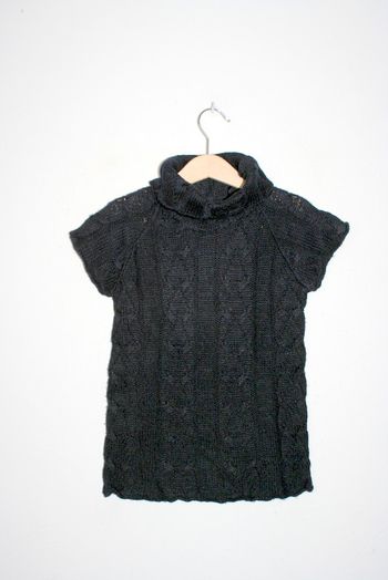 Pull noir col roulé Tissaia taille 6 ans