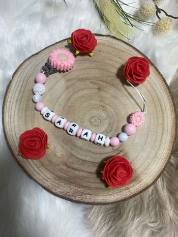 Attache tétine fleurs