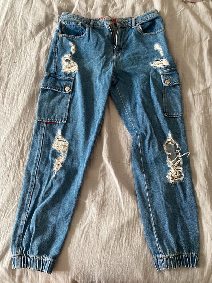 jean troué cargo taille 38