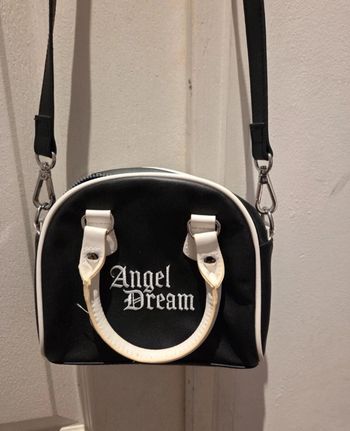 Petit sac blanc et noir avec double ance