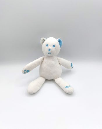 Peluche doudou ours MUSTI MUSTELA blanc bleu 24 cm