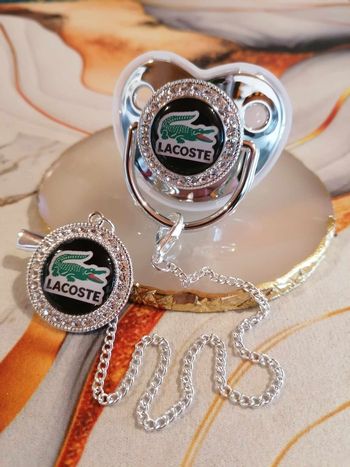 Sucette tétine Lacoste argenté