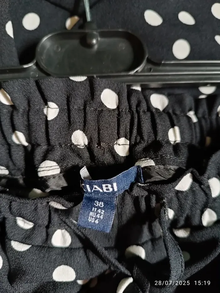 Pantalon fluide avec poches noir à pois blanc Kiabi - photo numéro 4