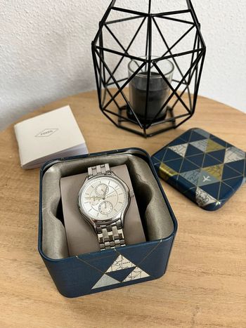 Montre argent fossil cadrent stras