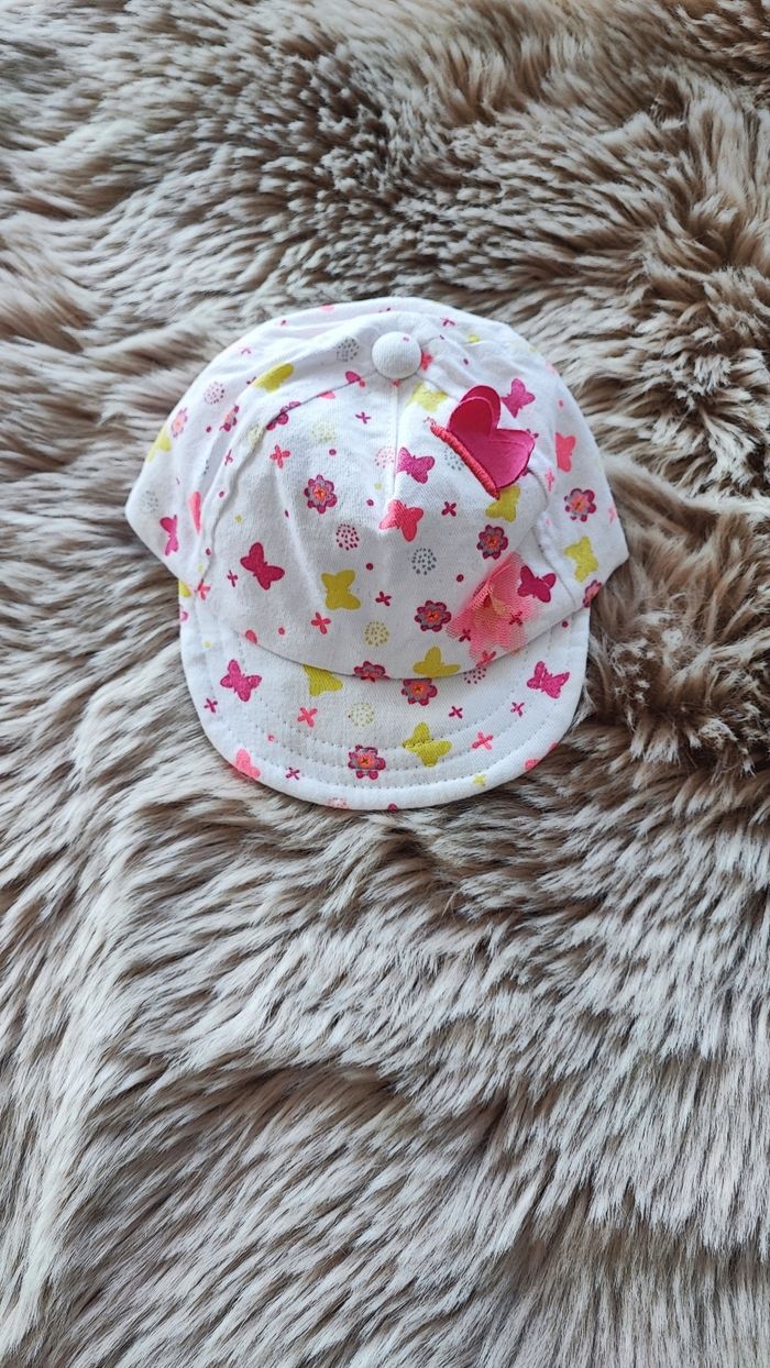 Casquette blanche rose orchestra 0/1 mois