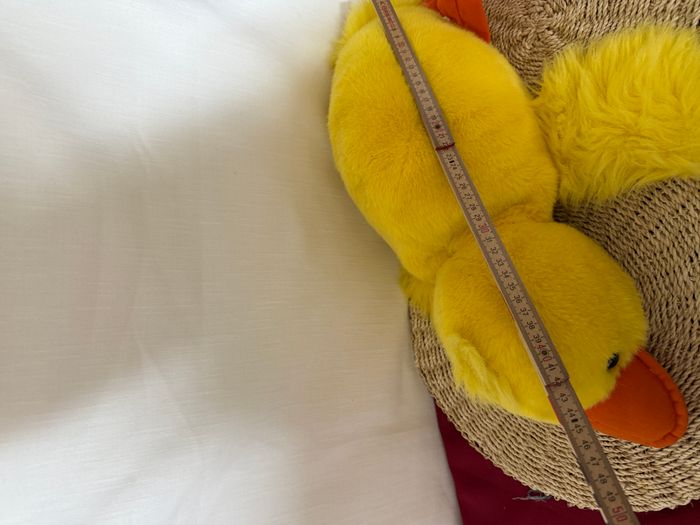 Peluche - Cache pyjama, canard jaune, allongé - photo numéro 6