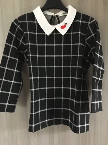 Top noir et blanc manche 3/4 T.S