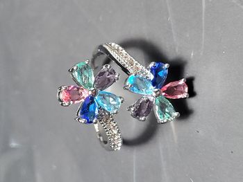 Bague ouverte acier inoxydable argenté avec fleurs multicolores