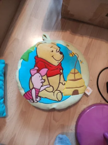Coussin Winnie l'ourson en très bon état