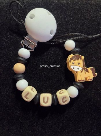 Attache tétine silicone ponney