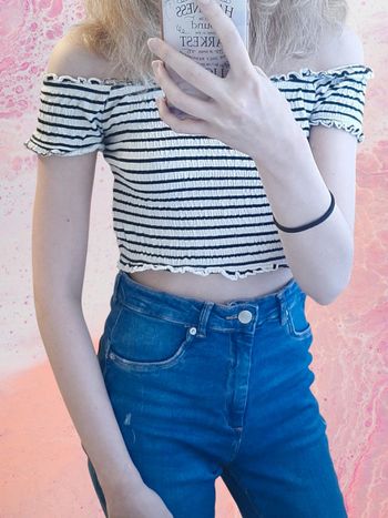 Top rayé noir et blanc épaules dénudées taille M