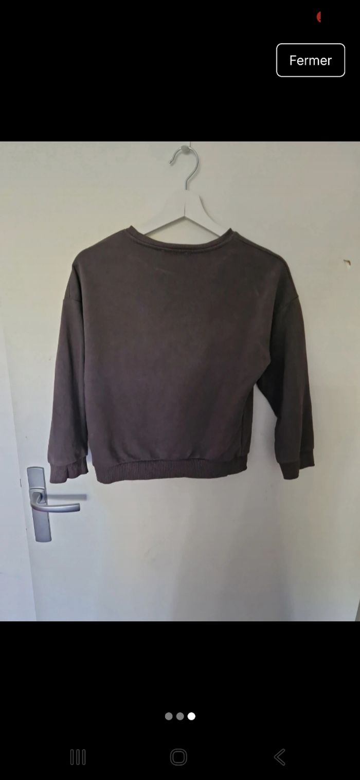 Pull noir/gris avec motifs